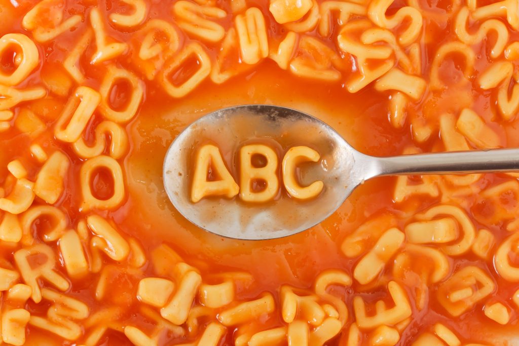 Pasta,Shaped,Abc,Letters,On,A,Spoon,Within,Pasta,Shaped