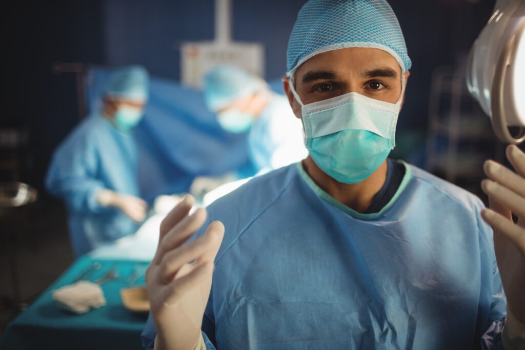 Portrait,Of,Male,Surgeon,Preparing,For,Operation,In,Operation,Room